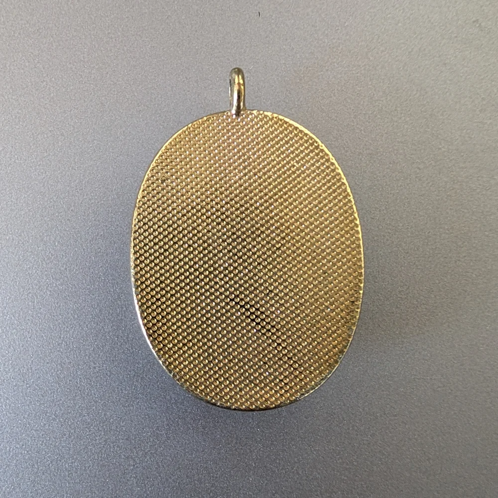 Polished Stone and Gold Tone Pendant